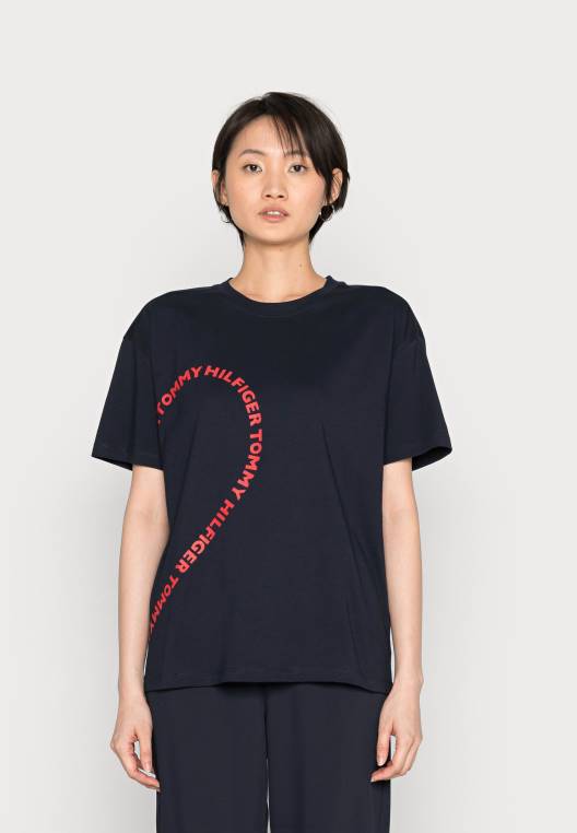 חולצת טריקו רגועה עם צווארון C NX208017 שמיים מדבריים Tommy Hilfiger