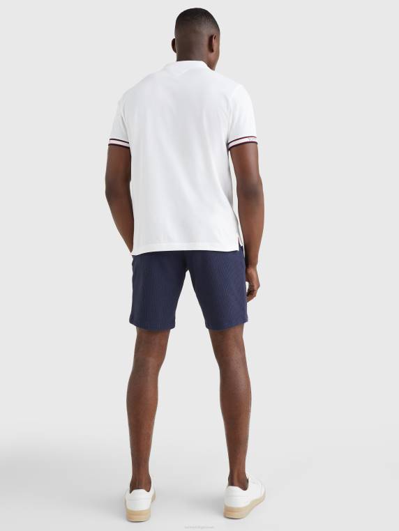 פולו עם שרוול לוגו בהתאמה רגילה NX201116 לבן Tommy Hilfiger