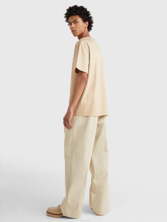 חולצת טי של לוגו קרסט NX201592 זהב עדין Tommy Hilfiger