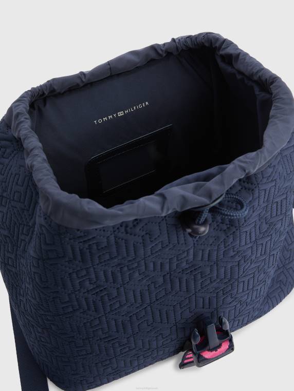 תיק גב מרופד מונוגרם NX20422 מבטא שמיים מדבריים Tommy Hilfiger