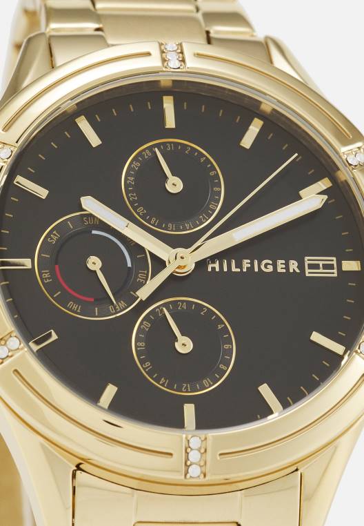 שעון כרונוגרף אריאנה NX205197 בצבע זהב Tommy Hilfiger