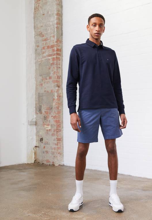 מכנסי חגורת ברוקלין NX205894 אינדיגו דהוי Tommy Hilfiger