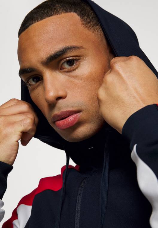 סווטשירט קפוצ'ון עם רוכסן בצבע חסום NX206315 שמיים מדבריים Tommy Hilfiger