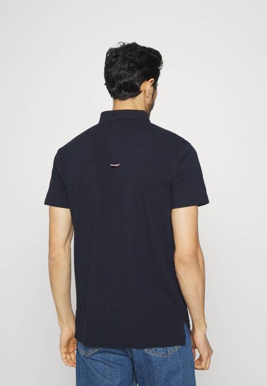 סמל חולצת פולו רגילה NX208034 שמיים מדבריים Tommy Hilfiger
