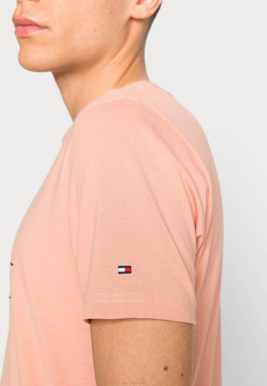 חולצת טריקו בהדפס יוניסקס מוערמים מודבקים NX208071 גויאבה Tommy Hilfiger